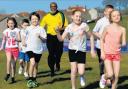 Jamaican Olympic sprint hero Anthony Davis paid a visit to Barshare Primary in 2014