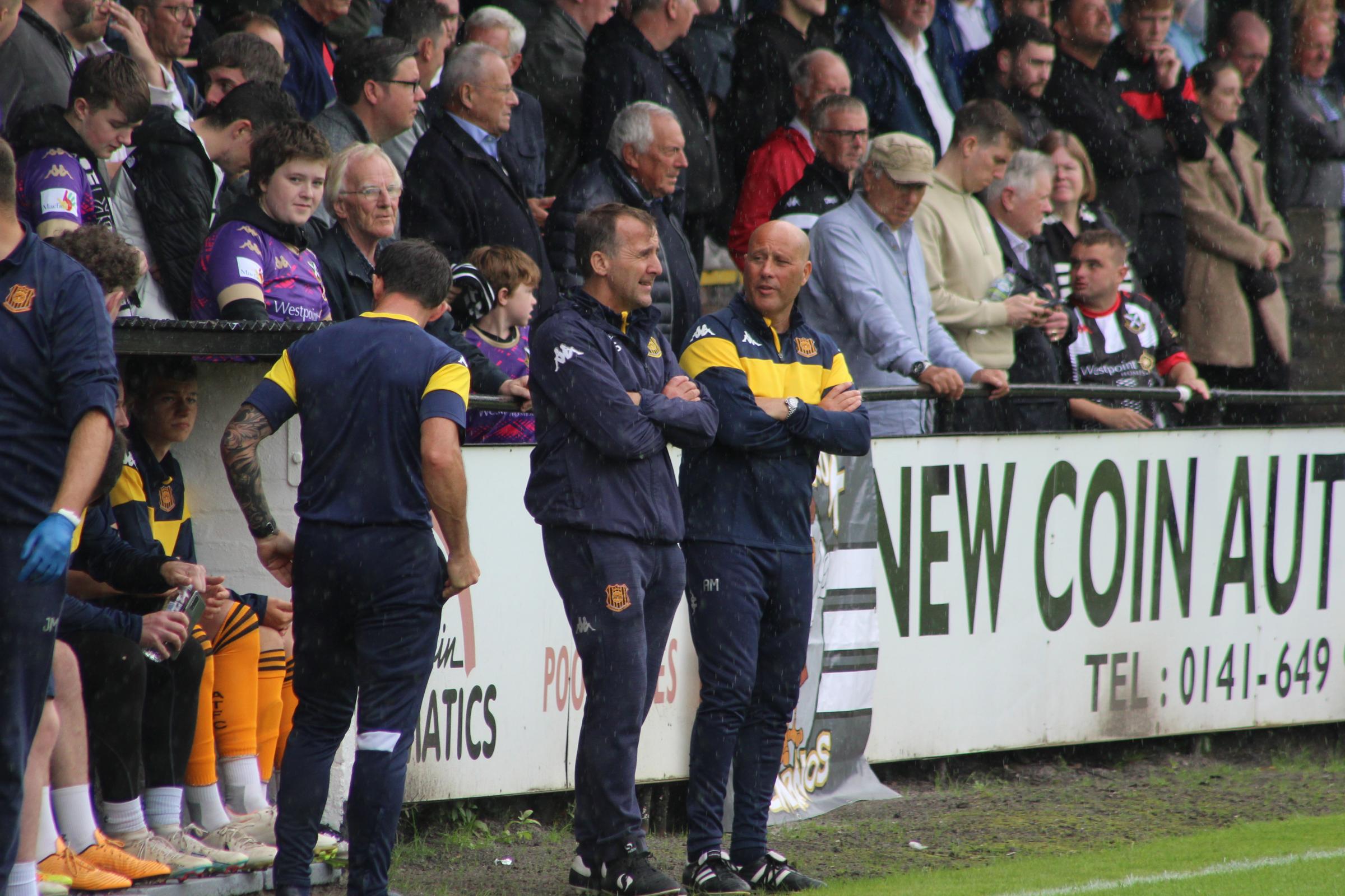 Talbot boss Tommy Sloan and assistant Allan McLuckie deep in conversation at Newlandsfield