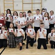 Mauchline P6 pupils show off their certificates