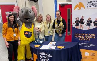 Staff from Dalrymple Primary School with ACS Mascot Hope
