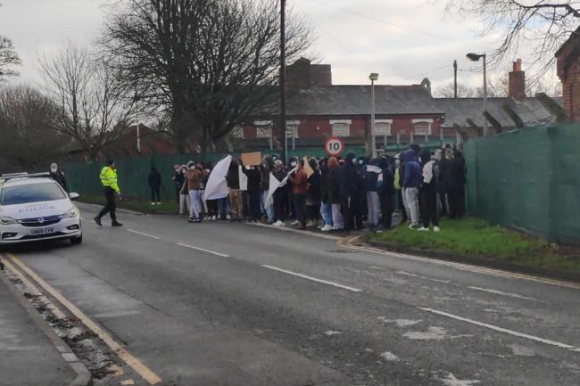 Asylum seekers shout 'freedom' during protest outside Army barracks | Cumnock Chronicle
