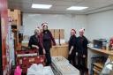 Staff at Pathhead Bakery preparing the goodies for the boxes