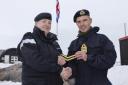 NAVY ICE PATROL SHIP BEGINS SECOND ANTARCTIC WORK PACKAGE

Pictured: Leading Chef Kayleigh Gibson receives her 8 year Good Conduct Badge from Captain Mike Wood while ashore at Port Lockroy.

On 15th January 2022 HMS Protector sailed south from the