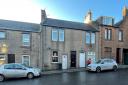 The flat for sale in Auchinleck (Image: Auction House Scotland)