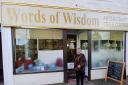 Marge Paterson outside of the Words of Wisdom shop
