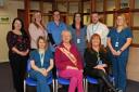 Jacquie Stewart (front centre, with her Tanyard Muirkirk Medical Group colleages) retires on March 31