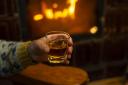 From The George Hotel in Inveraray to The Stein Inn on the Isle of Skye, here are Scotland's best pubs with fires