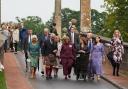 In Pictures: Charles and Camilla unfurl giant knitted patchwork at Dumfries House