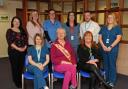 Jacquie Stewart (front centre, with her Tanyard Muirkirk Medical Group colleages) retires on March 31