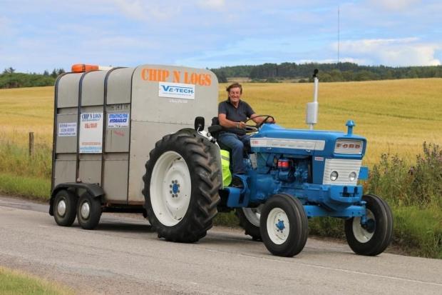 Cumnock Chronicle: David Shaw of Sorn on his Ford 5000 and pulling the sponsored trailer with all supplies and spares/diesel