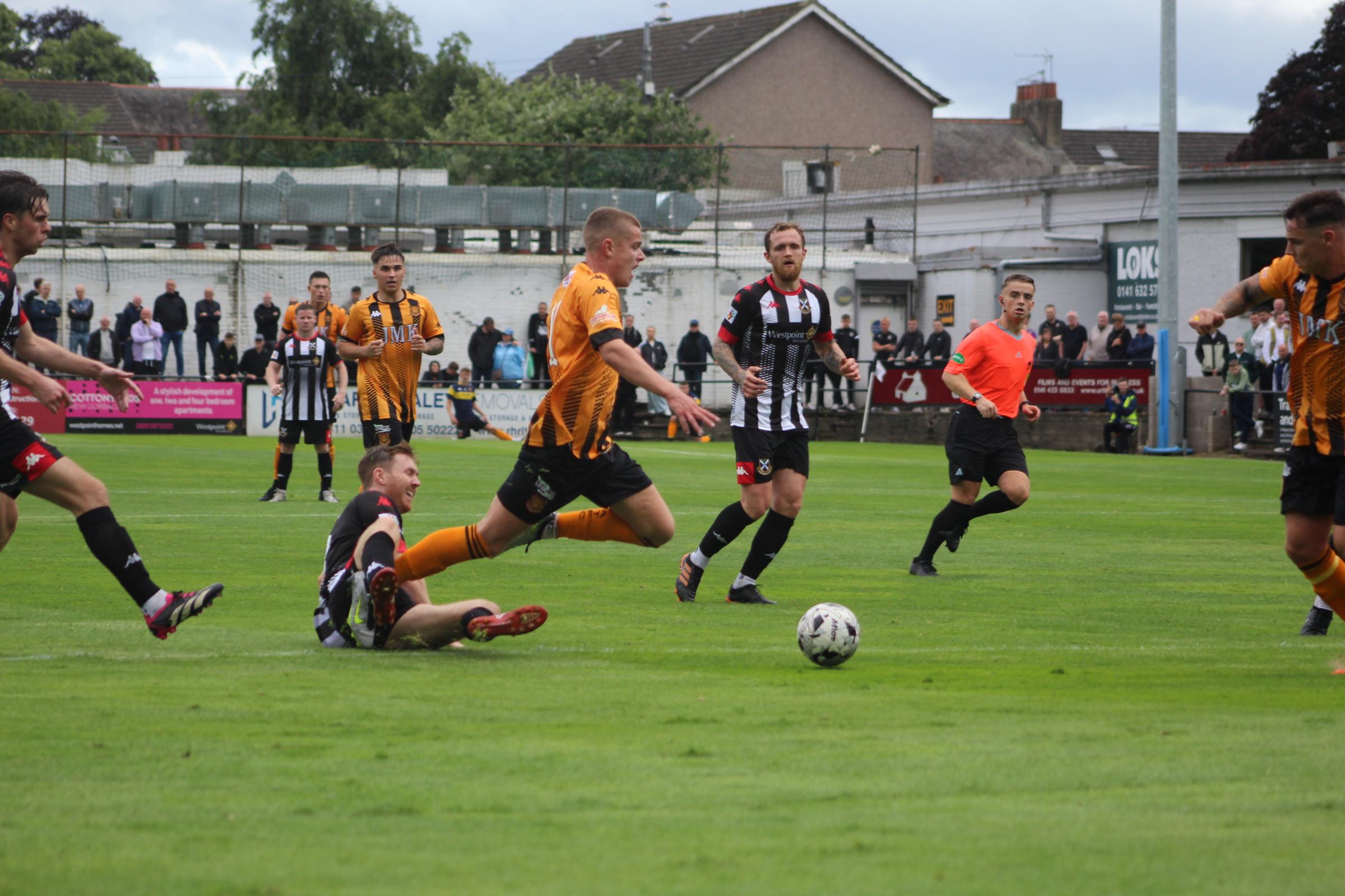Ewan Thomson tumbles under a challenge from Ross Lindsay during Talbot’s 1-0 loss to Pollok on Saturday - this photo suggests contact was made just outside the box, though referee Jamie Wilkie waved away the visitors’ appeals for either a