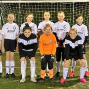Cumnock girls’ football team lands vital funds from leading supermarket