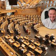 Kevin Simmonds (inset), of Compliance LEV, has seen his firm's expansion plans praised at the Scottish Parliament