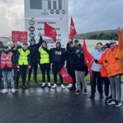 Striking workers outside the Kelloholm plant