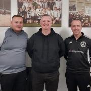 New manager, Murdo MacKinnon, accompanied by Stevie Aitchison and Greig Mitchell.