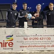Cumnock Juniors under-20s celebrate their new sponsor.